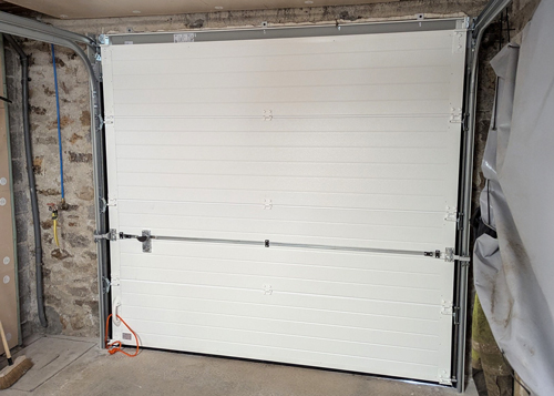 menuiserie-petit87-menuiserie-exterieure-porte-de-garage-sectionnelle